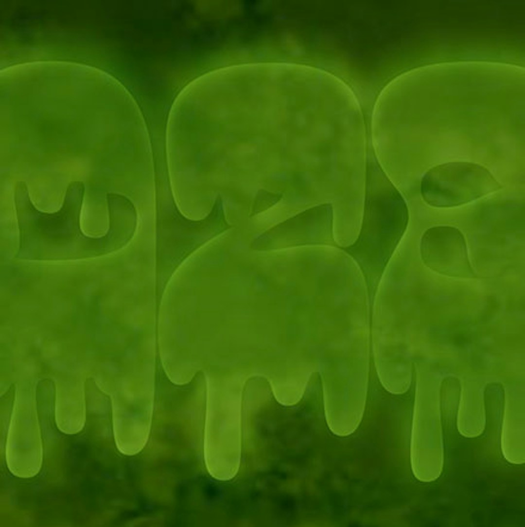 Green glowing dripping slime text